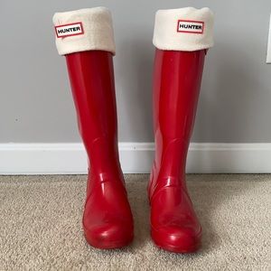 Tall red Hunter boots with winter sock inserts